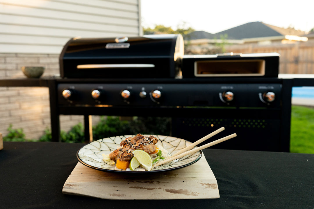 Grilled Chicken Thighs with Kikkoman Soy Sauce, Mango & Rice Noodle Salad